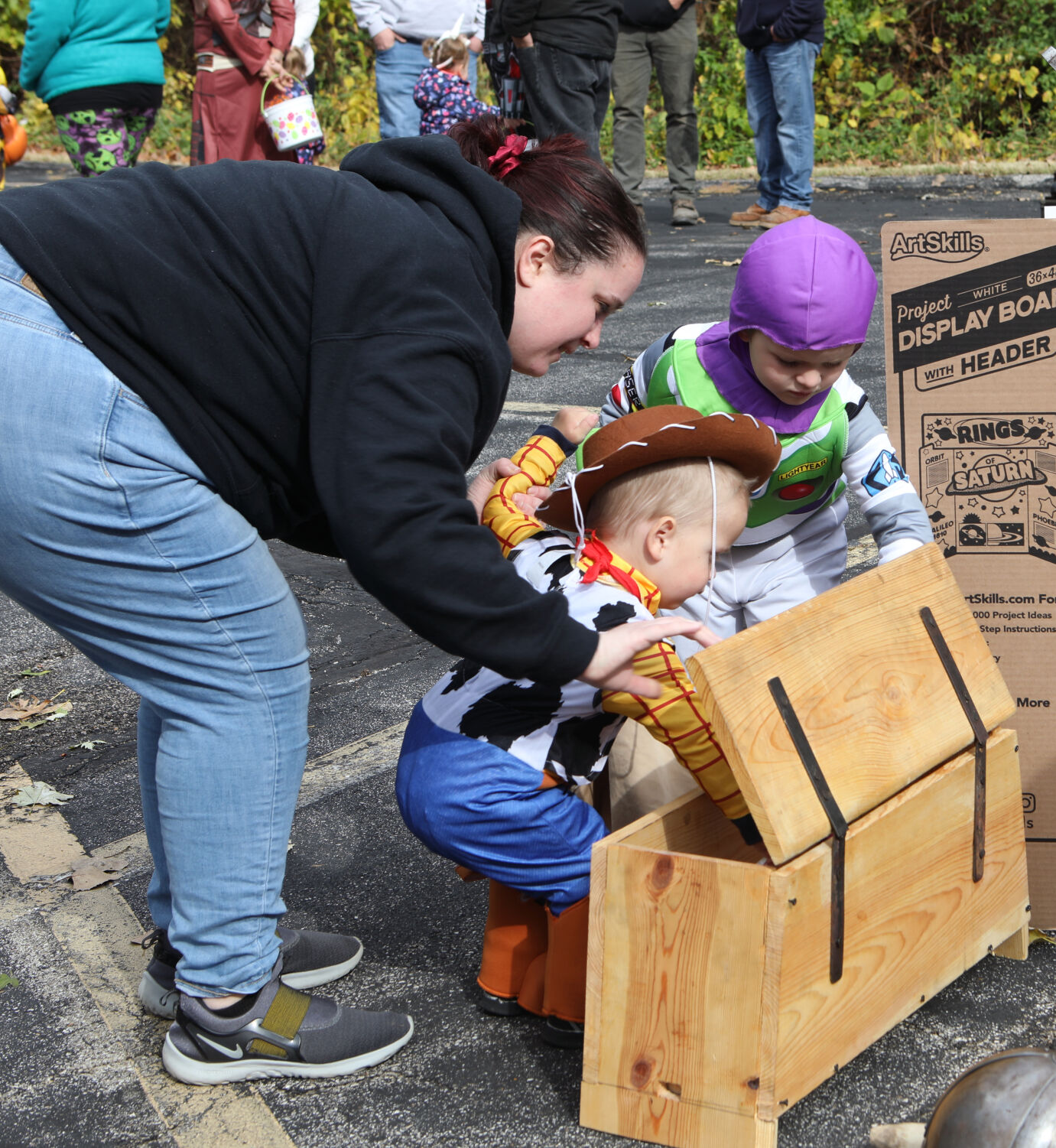 Amanda Gilmor helps Henry and Michael get candy